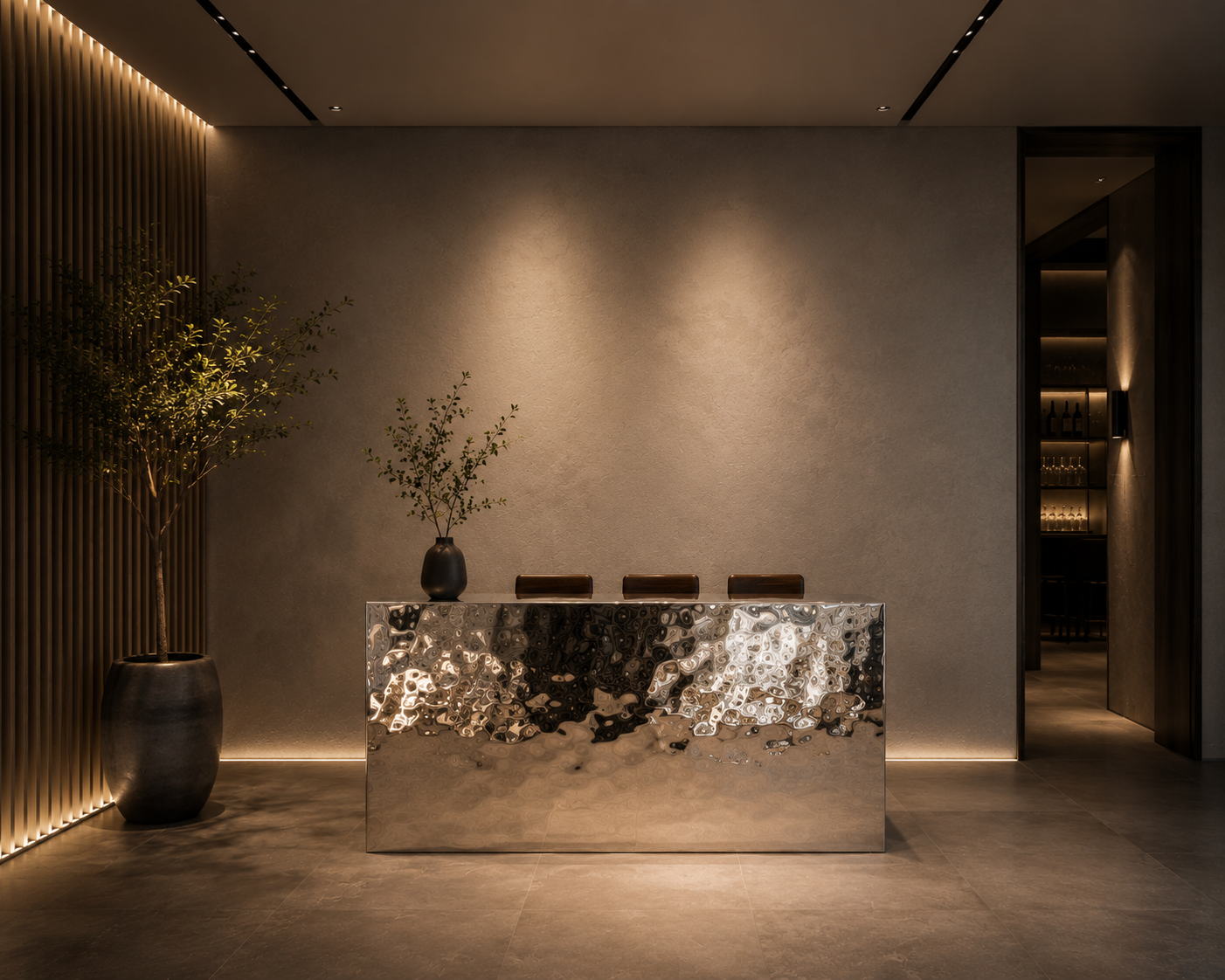 Luxury stainless steel reception desk handcrafte by Veliento for hotels, restaurants and premium commercial interiors.